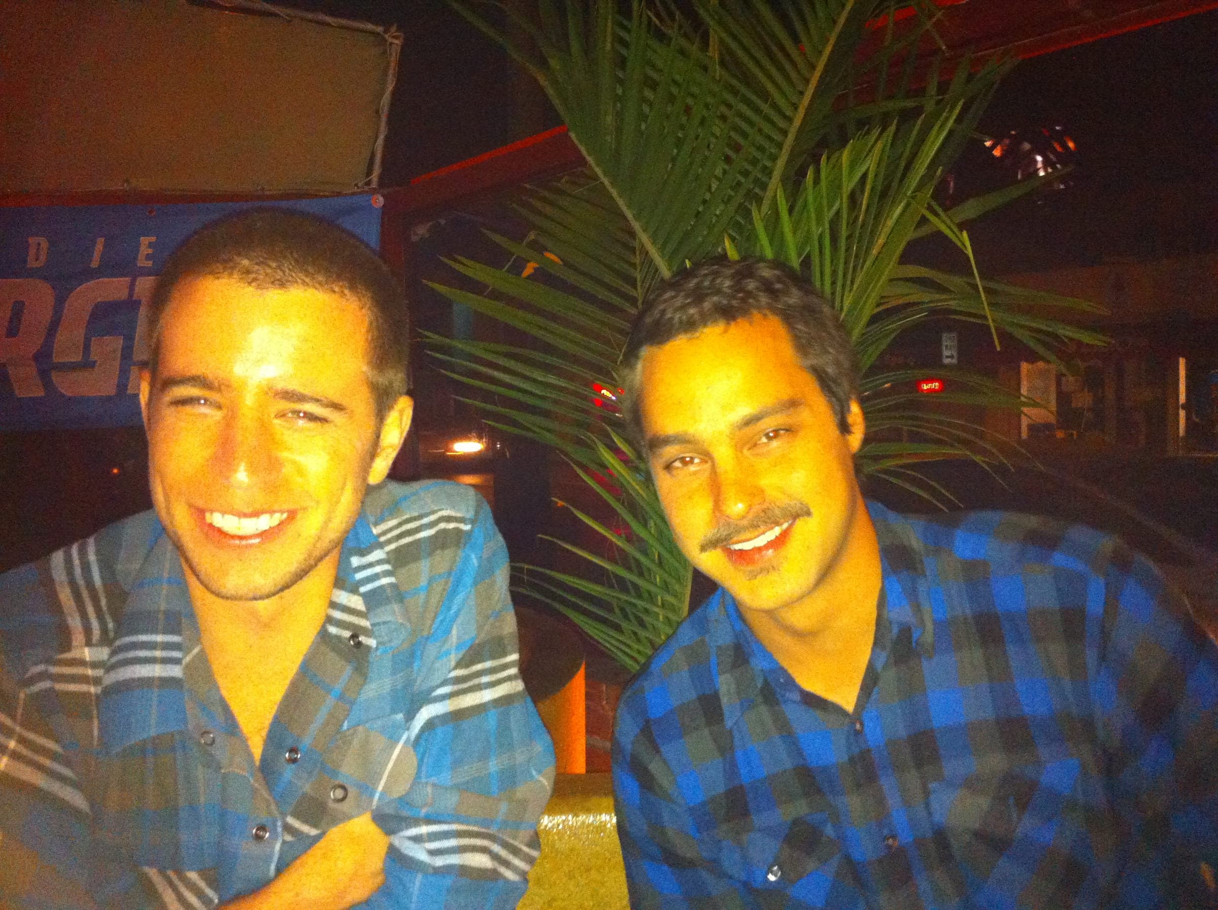 Justin with a friend at night