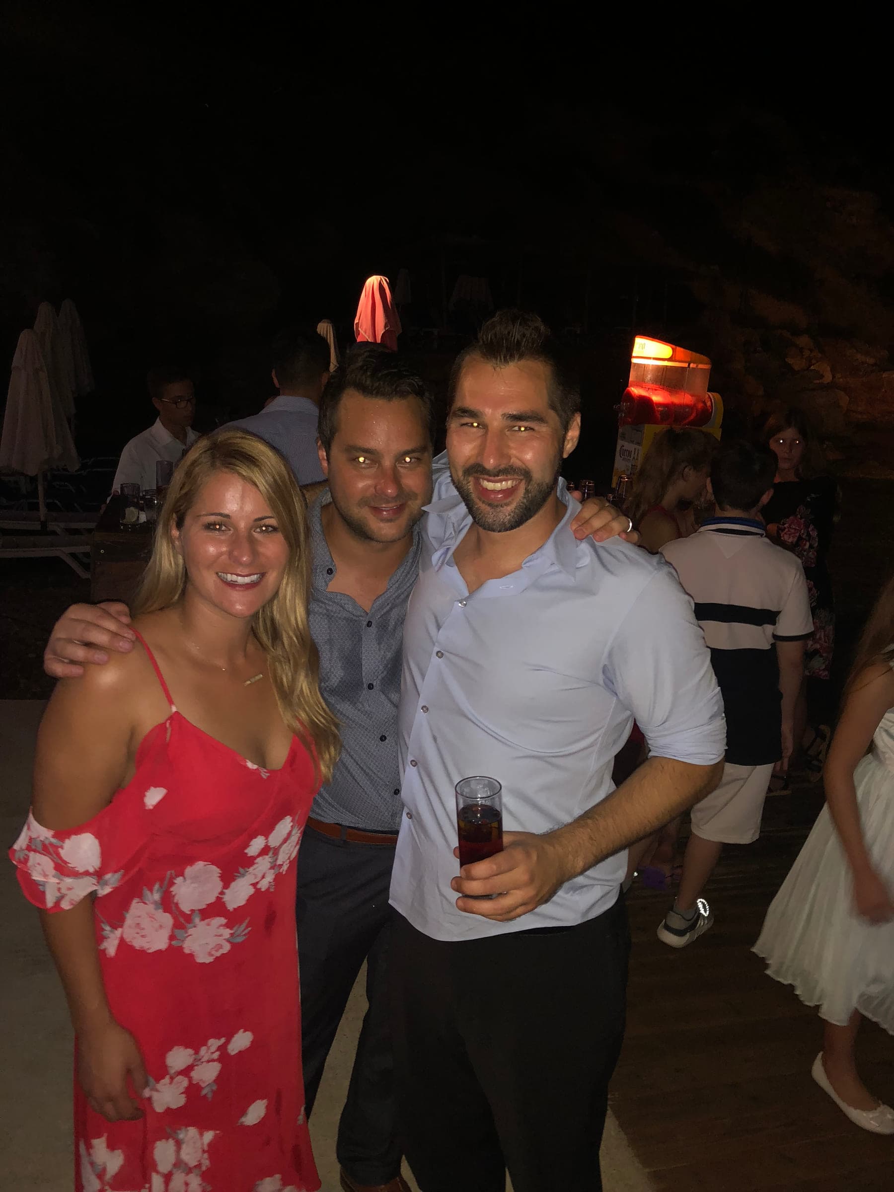 Justin with friends at an evening party